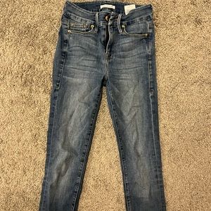 Good American jeans. Distressed back pocket.